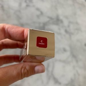 Brand New, Becca Cosmetics lipstick in Cherry